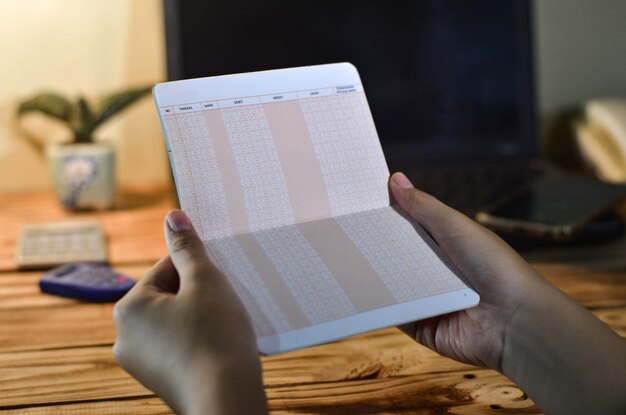 A split-screen image. On one side, a hand confidently placing an SAT test booklet into a recycling bin. On the other side, a diverse group of students collaborating on a group project, showcasing skills beyond standardized tests.