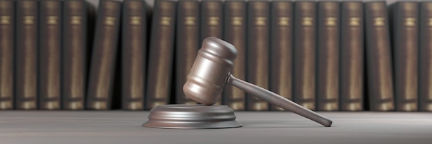 A close-up shot of a gavel resting on a stack of law books, symbolizing legal and financial implications.